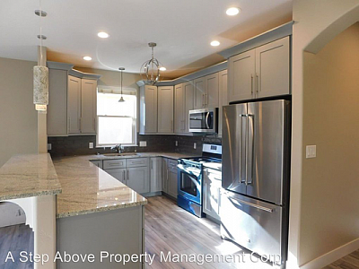 A Step Above - Grand Junction | Realtors & Real Estate | Logo