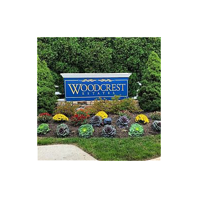 Woodcrest Estates - Port Jefferson Station | Apartments & Rentals | Logo